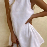 Tindall | Vestido mini de verano sin mangas con dobladillo ondulado para mujer