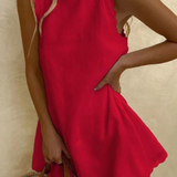 Tindall | Vestido mini de verano sin mangas con dobladillo ondulado para mujer