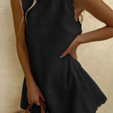 Tindall | Vestido mini de verano sin mangas con dobladillo ondulado para mujer