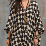 Vestido maxi caftán de inspiración bohemia con lunares y corte holgado