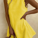 Tindall | Vestido mini de verano sin mangas con dobladillo ondulado para mujer