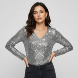 Blusa con brillo sutil en tejido ligero | Corte fluido | Escote en V elegante