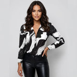 Blusa elegante con patrón fluido | Corte ajustado | Escote en V con botones