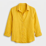 Blusa femenina de lino con corte suelto y cuello clásico