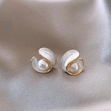 Opala | Exclusivos pendientes blancos