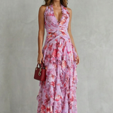 Vestido maxi encantador con escote halter y cascada de rosas