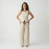Conjunto Elegante con Top Sin Mangas y Pantalón Amplio con Detalle Contrastante