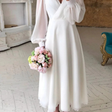 Arabella | Vestido midi de manga abullonada con escote en V para invitadas de boda