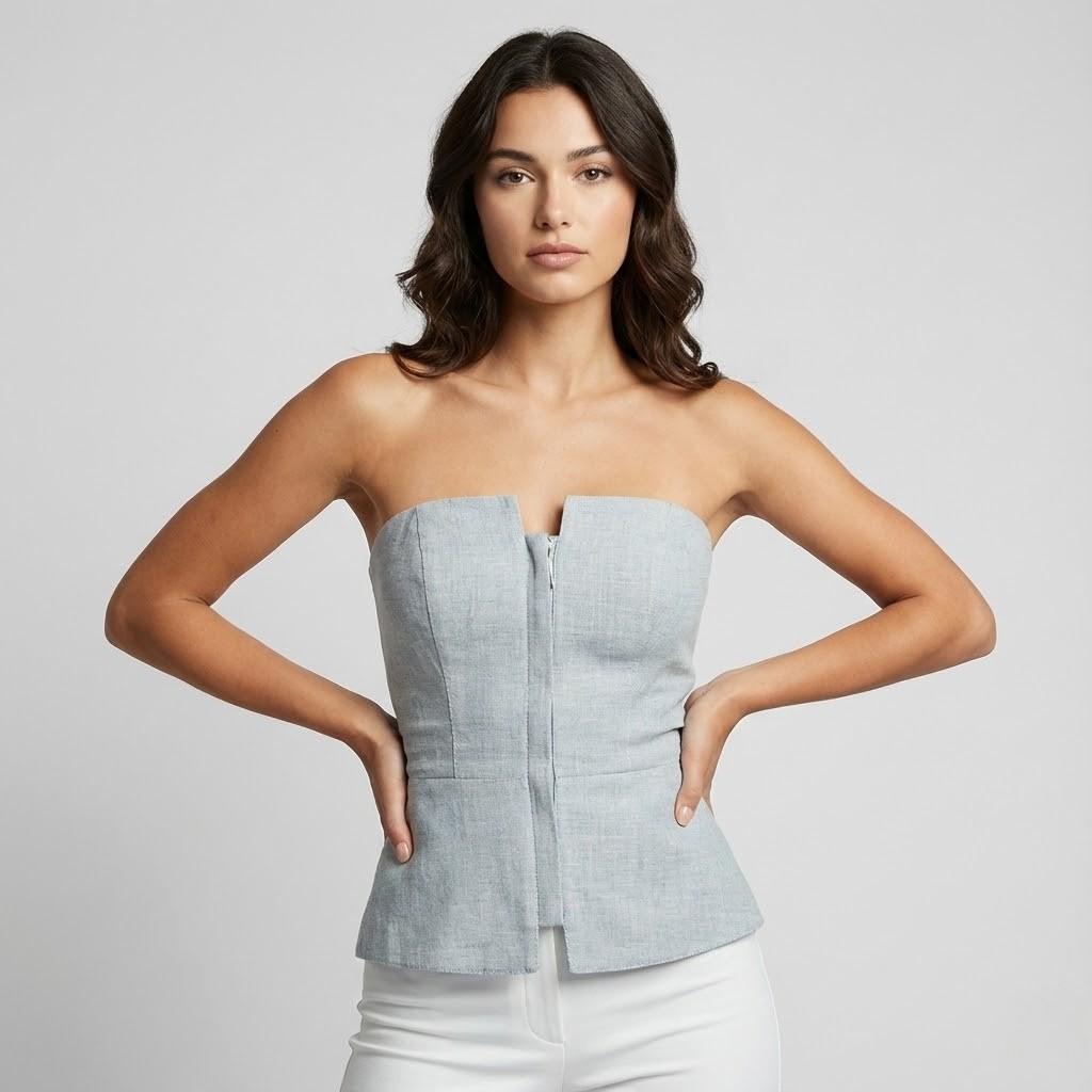 Top bustier elegante en viscosa estructurada | Corte entallado con peplum | Sofisticación moderna