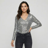 Blusa con brillo sutil en tejido ligero | Corte fluido | Escote en V elegante