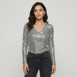 Blusa con brillo sutil en tejido ligero | Corte fluido | Escote en V elegante