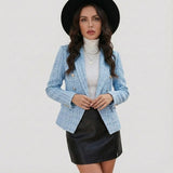 Blazer estructurado en tejido texturizado | Corte entallado | Detalle de botones decorativos