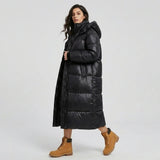 Abrigo acolchado largo con capucha | Corte cómodo | Confort urbano de invierno