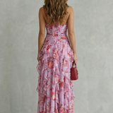 Vestido maxi encantador con escote halter y cascada de rosas