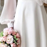 Arabella | Vestido midi de invitada de boda con cuello en V y mangas abullonadas