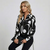 Blusa femenina elegante con escote en V y corte fluido