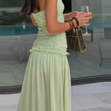 Florette | Vestido maxi sin mangas en verde salvia para invitadas de boda
