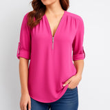 Blusa femenina fluida con escote en V y mangas dobladas