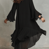 Elegante vestido midi bohemio negro asimétrico con pliegues