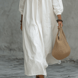 Vestido maxi blanco bohemio con bordado de flores y mangas globo