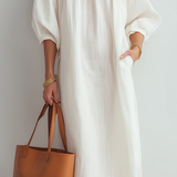 Vestido midi crema de corte relajado