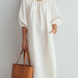 Vestido midi crema de corte relajado