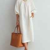 Vestido midi crema de corte relajado