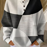 Christa | Jersey patchwork en negro y blanco