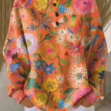 Wiebke | Jersey naranja con flores