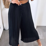 Maya | Pantalones plisados Melnas — comodidad ligera y corte elegante