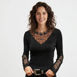 Top femenino con encaje floral y escote elegante