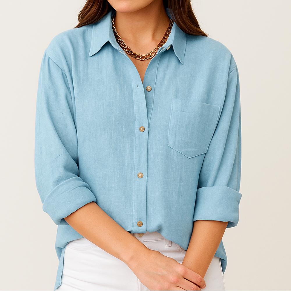 Blusa femenina de manga larga con corte suelto y bolsillo frontal