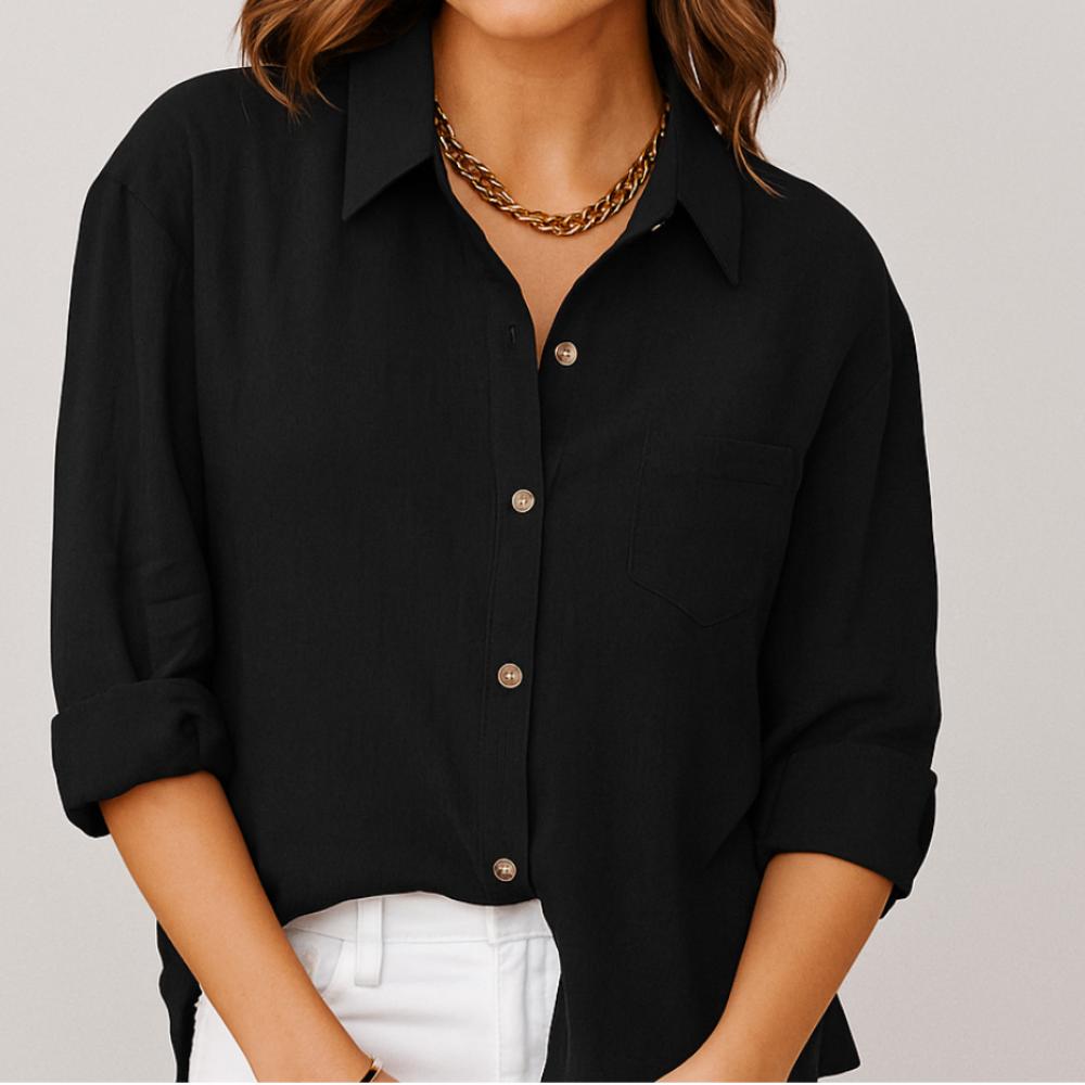 Blusa femenina de manga larga con corte suelto y bolsillo frontal