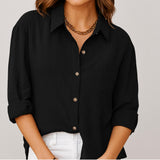 Blusa femenina de manga larga con corte suelto y bolsillo frontal