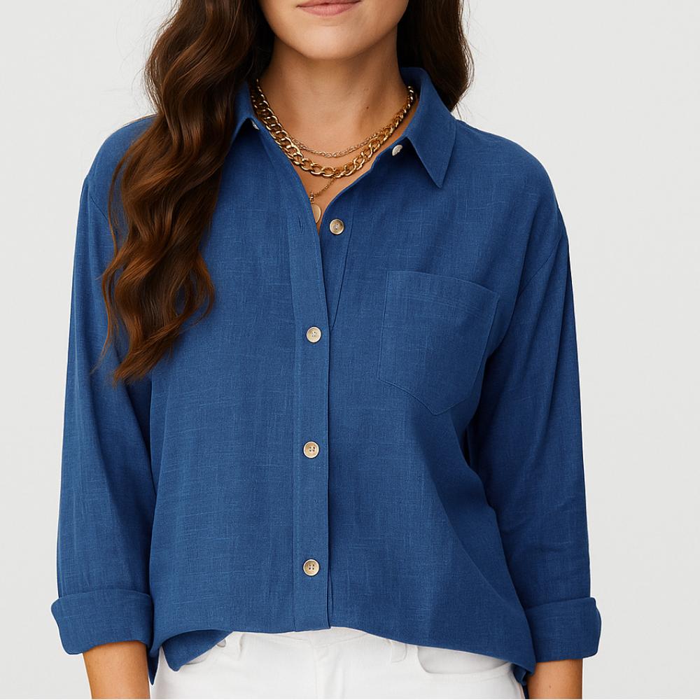 Blusa femenina de manga larga con corte suelto y bolsillo frontal