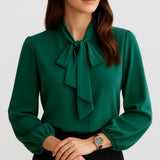 Blusa femenina elegante con lazo en el escote y manga larga