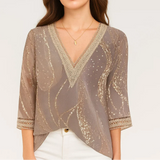 Blusa elegante con escote en V y mangas tres cuartos para mujer