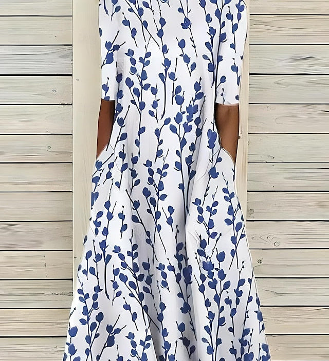 Sela™ – Vestido midi con flores costeras
