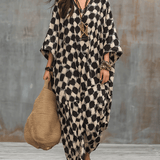Vestido maxi caftán de inspiración bohemia con lunares y corte holgado