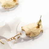Egle | Pendientes en forma de pétalo de orquídea