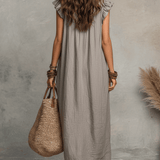 Vestido maxi bohemio sin mangas con escote en V y caída fluida