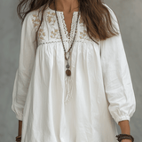 Vestido maxi blanco bohemio con bordado de flores y mangas globo