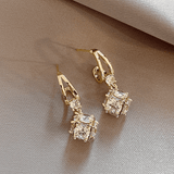Luz | Elegantes pendientes dorados con circonitas – diseño exclusivo