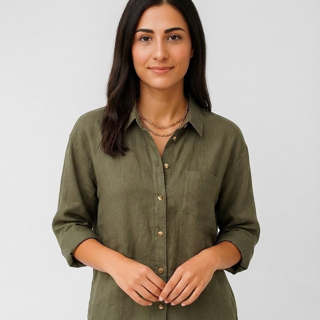Blusa femenina de manga larga con corte suelto y bolsillo frontal