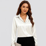 Blusa femenina elegante de manga larga con corte clásico