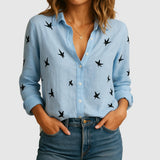 Blusa femenina de lino con corte suelto y cuello clásico