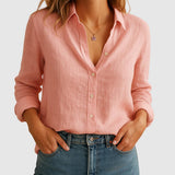 Blusa femenina de lino con corte suelto y cuello clásico