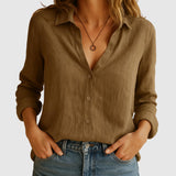 Blusa femenina de lino con corte suelto y cuello clásico