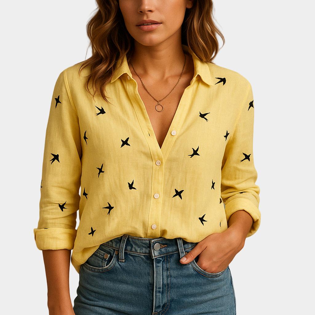 Blusa femenina de lino con corte suelto y cuello clásico