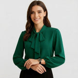 Blusa femenina elegante con lazo en el escote y manga larga